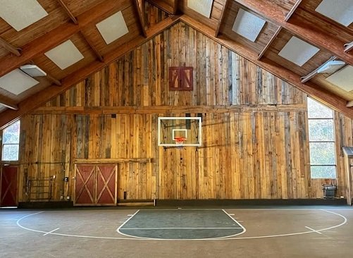 Barn-Style Indoor Basketball Court with Skylights