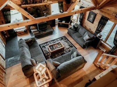 Truckee Cabin Living Room with Stone Fireplace & Vaulted Wood Ceiling