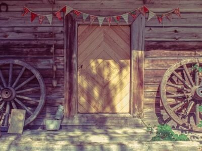 Frontier Cabin Porch with Wagon Wheels