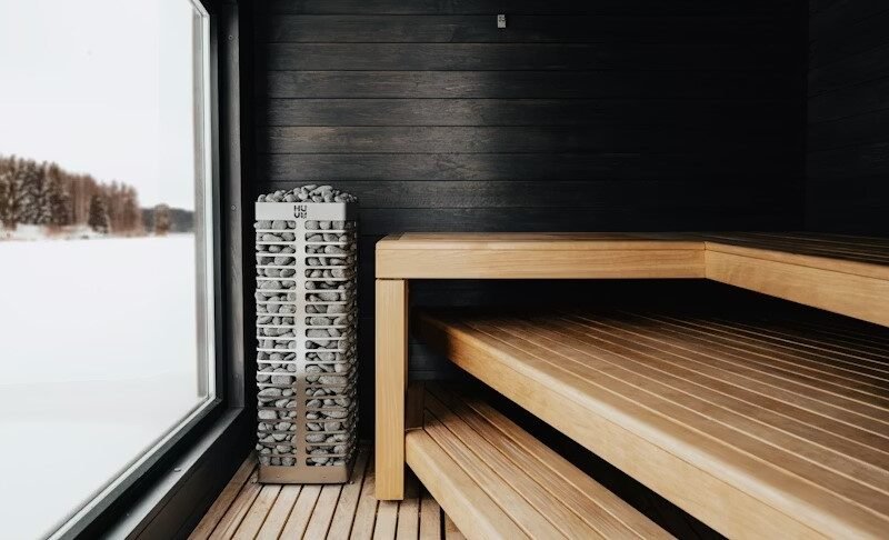 Modern sauna with snowy view