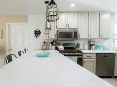 Beautiful and bright kitchen with a long dining table for tasting