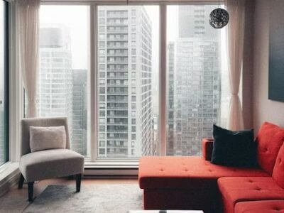 High-rise apartment, floor-to-ceiling windows, city views, filming, TikTok, YouTube