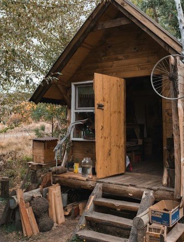 Rustic cabin studio, outdoor setting, filming, TikTok, YouTube